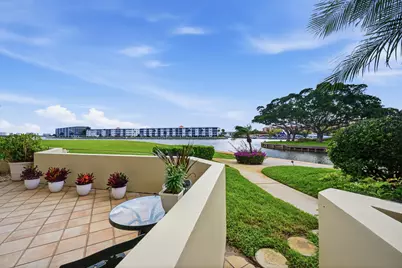 1109 E Marine Way E L1l + Boat Slip #55, North Palm Beach, FL 33408 - Photo 1