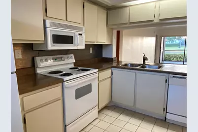 12962 Briarlake Drive #103, Palm Beach Gardens, FL 33418 - Photo 4