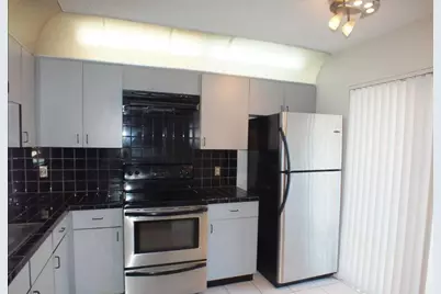 300 E Club Circle #201, Boca Raton, FL 33487 - Photo 1