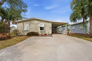 566 Dolphin Cir, Barefoot Bay, FL 32976 - Photo 1