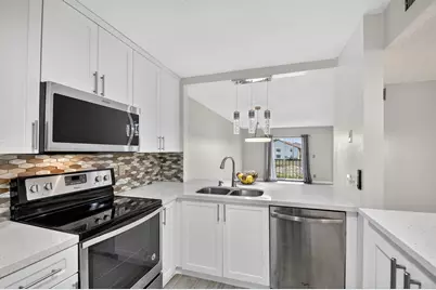 7142 Golf Colony Court #206, Lake Worth, FL 33467 - Photo 1