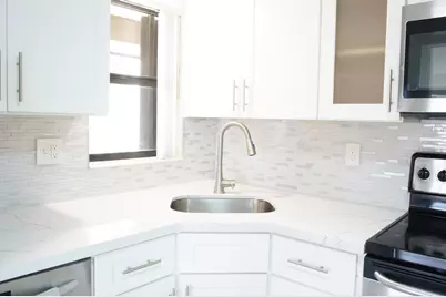 8649 Boca Glades Boulevard W #E, Boca Raton, FL 33434 - Photo 12