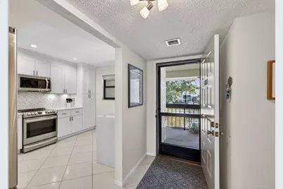 12871 Briarlake Drive #203, Palm Beach Gardens, FL 33418 - Photo 2