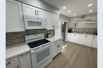 7669 Springwater Place #102, Boynton Beach, FL 33437 - Photo 2