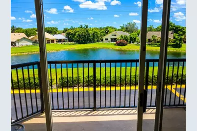8761 Wiles Road #303, Coral Springs, FL 33067 - Photo 1