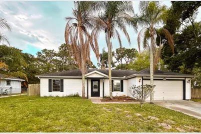 1898 SW Lofgren Avenue, Port Saint Lucie, FL 34953 - Photo 1