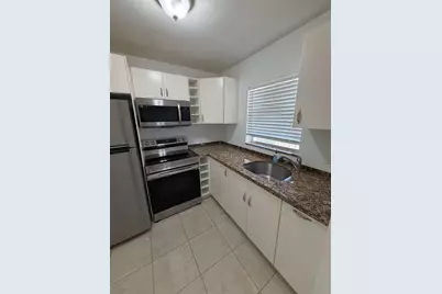 9851 Sandalfoot Boulevard #220, Boca Raton, FL 33428 - Photo 1