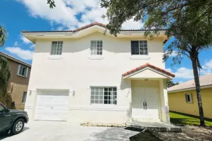 7634 NW 99th Way NW, Tamarac, FL 33321 - Photo 1