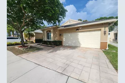 250 E Riverbend Drive, Sunrise, FL 33326 - Photo 1