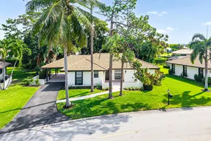 433 Pine Villa Dr, Atlantis, FL 33462 - Photo 1