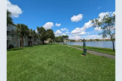 5001 Wiles Road #105, Coconut Creek, FL 33073 - Photo 1