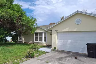 374 SW De Gouvea Terrace, Port Saint Lucie, FL 34984 - Photo 1