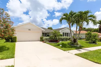 10821 Greentrail Drive, Boynton Beach, FL 33436 - Photo 1