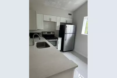 610 Gardens Drive #203, Pompano Beach, FL 33069 - Photo 1