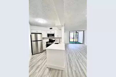 214 Lake Pointe Drive #103, Oakland Park, FL 33309 - Photo 1