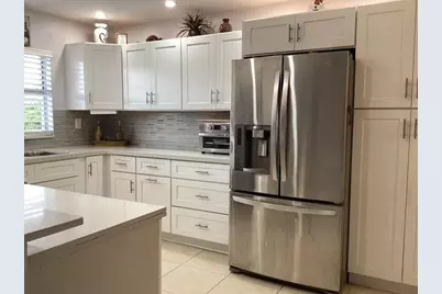 9481 Sunrise Lakes Boulevard #303, Sunrise, FL 33322 - Photo 1