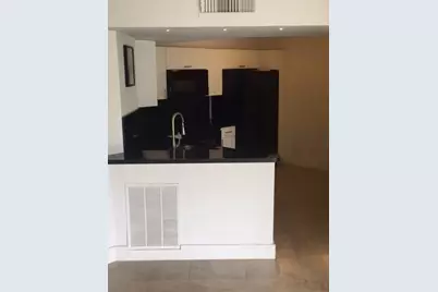 8761 Wiles Road #103, Coral Springs, FL 33067 - Photo 1