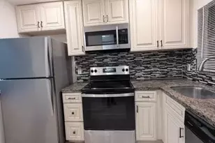 9949 Sandalfoot Blvd, Boca Raton, FL 33428 - Photo 1