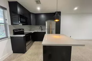 975 NE 40th St, Oakland Park, FL 33334 - Photo 1