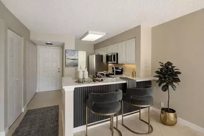 2228 N Cypress Bend Drive #407, Pompano Beach, FL 33069 - Photo 1