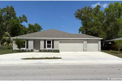 256 NE St James Drive, Port Saint Lucie, FL 34983 - Photo 1