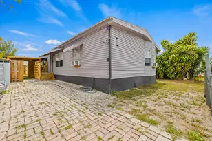 10592 SW Sandalfoot Blvd, Boca Raton, FL 33428 - Photo 1