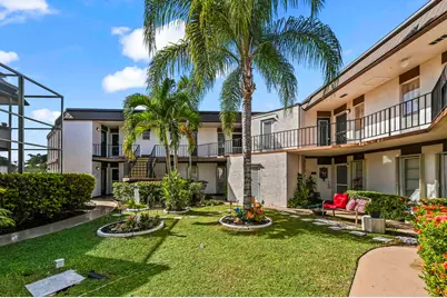 6 Greenway Village N #212, Royal Palm Beach, FL 33411 - Photo 1
