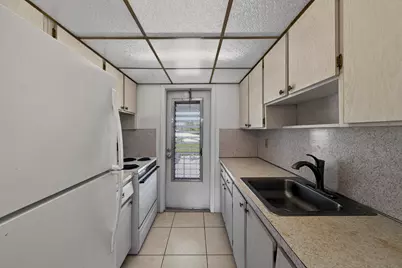 2551 W Golf Boulevard #209, Pompano Beach, FL 33064 - Photo 1