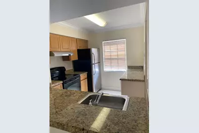 1105 Lake Shore Drive #203, Lake Park, FL 33403 - Photo 1