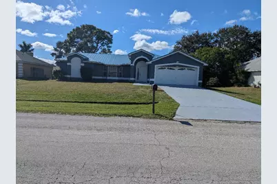 1122 SE Puritan Lane, Port Saint Lucie, FL 34983 - Photo 1