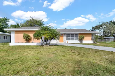 153 NE Tunison Avenue, Port Saint Lucie, FL 34983 - Photo 1