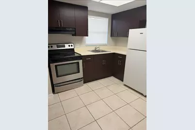 101 NE 41st Street #A8, Oakland Park, FL 33334 - Photo 1