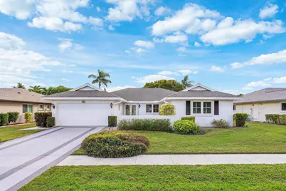 10848 Greentrail Drive S, Boynton Beach, FL 33436 - Photo 1
