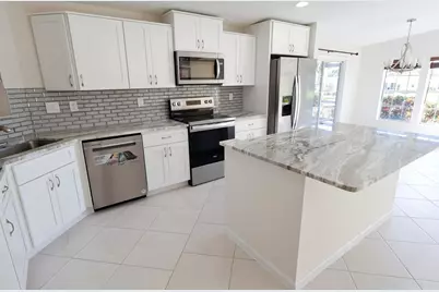 7654 Eastern Bluebird Drive, Port Saint Lucie, FL 34952 - Photo 1