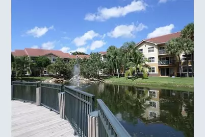 8781 Wiles Road #203, Coral Springs, FL 33067 - Photo 1
