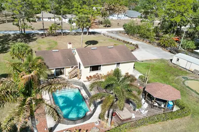 16974 W Glasgow Drive, The Acreage, FL 33470 - Photo 1
