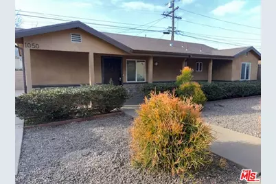 1050 W 102nd St, Los Angeles, CA 90044 - Photo 1