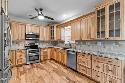 331 NE 49th Street, Oak Island, NC 28465 - Photo 16