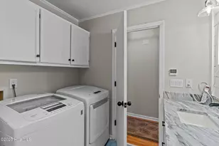 211 NE 55th St, Oak Island, NC 28465 - Photo 26