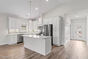 204 NE 33rd St, Oak Island, NC 28465 - Photo 16