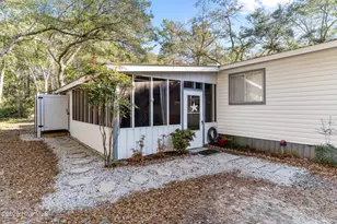 220 NE 68th St, Oak Island, NC 28465 - Photo 1