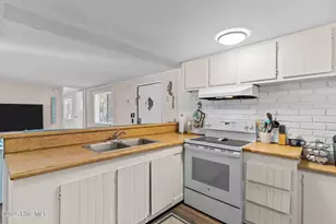 220 NE 68th St, Oak Island, NC 28465 - Photo 10