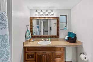 220 NE 68th St, Oak Island, NC 28465 - Photo 20