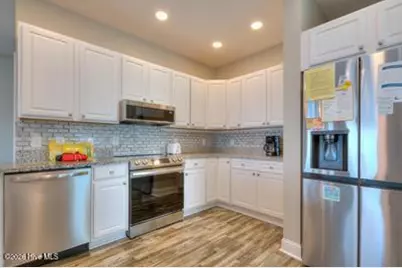 5103 W Beach Drive, Oak Island, NC 28465 - Photo 16