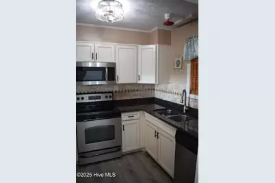 1000 Caswell Beach Road #405, Oak Island, NC 28465 - Photo 6