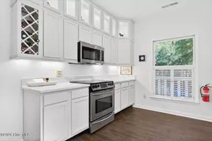 99 Oceangreens Ln, Oak Island, NC 28465 - Photo 12