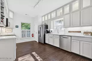 99 Oceangreens Ln, Oak Island, NC 28465 - Photo 16