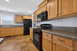 110 NE 67th St, Oak Island, NC 28465 - Photo 18