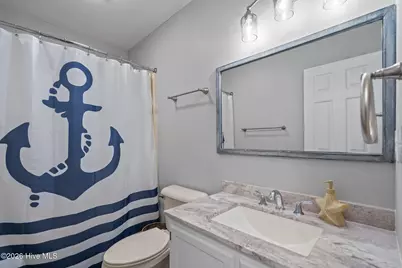 321 NE 59th Street, Oak Island, NC 28465 - Photo 32