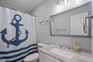 321 NE 59th St, Oak Island, NC 28465 - Photo 32